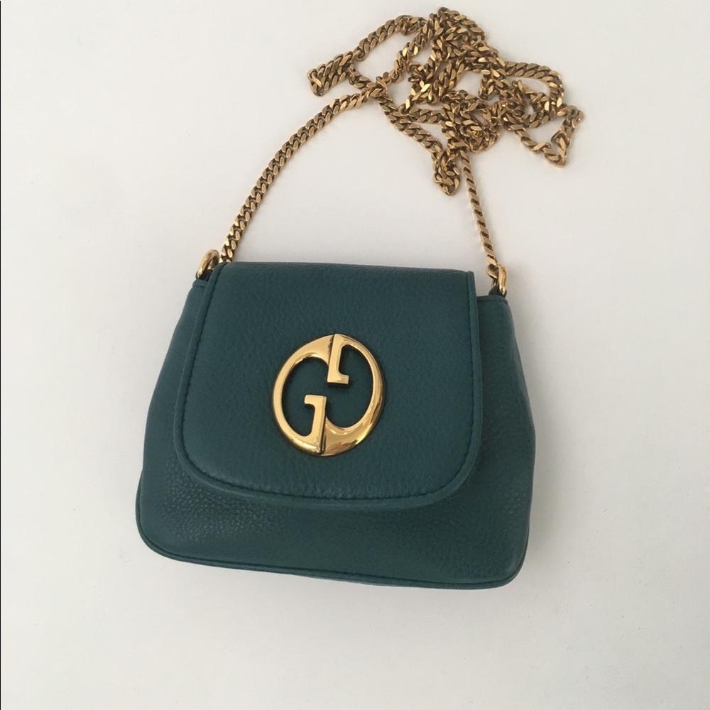 X SOLD X Authentic Gucci, small green bag with classic gold hardware and chain.